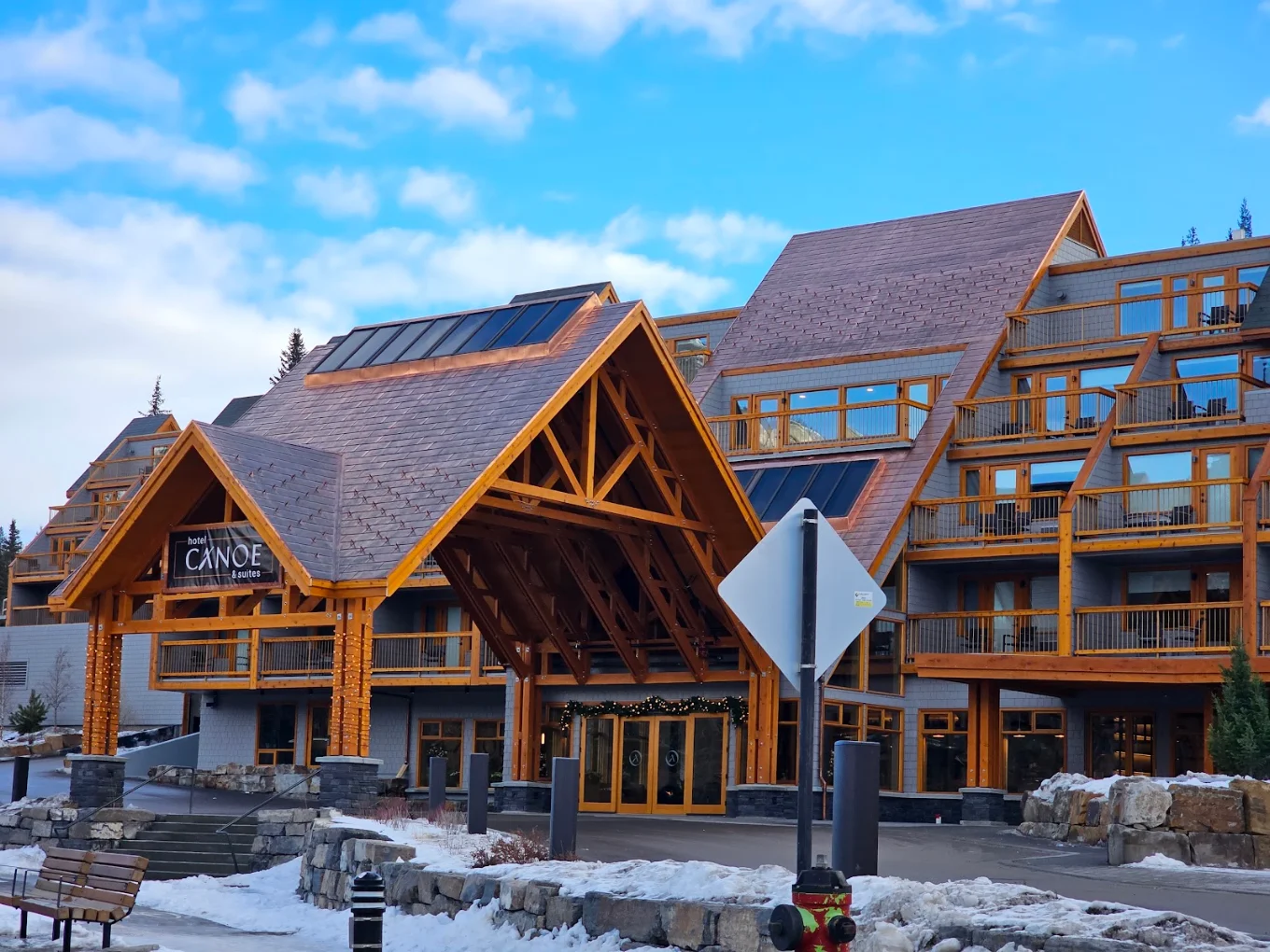 Hotel Canoe & Suites exterior in winter, Banff Avenue